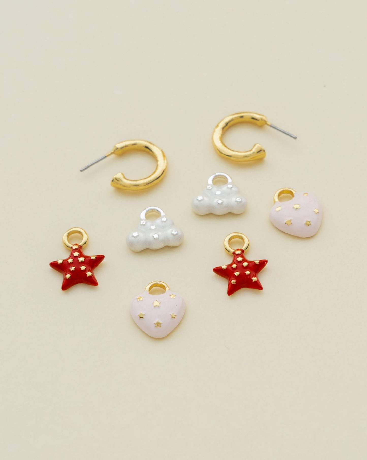 Lluvia de amor Earrings with triple charm
